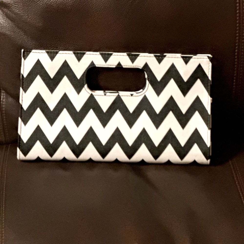 Black and white clutch handbag